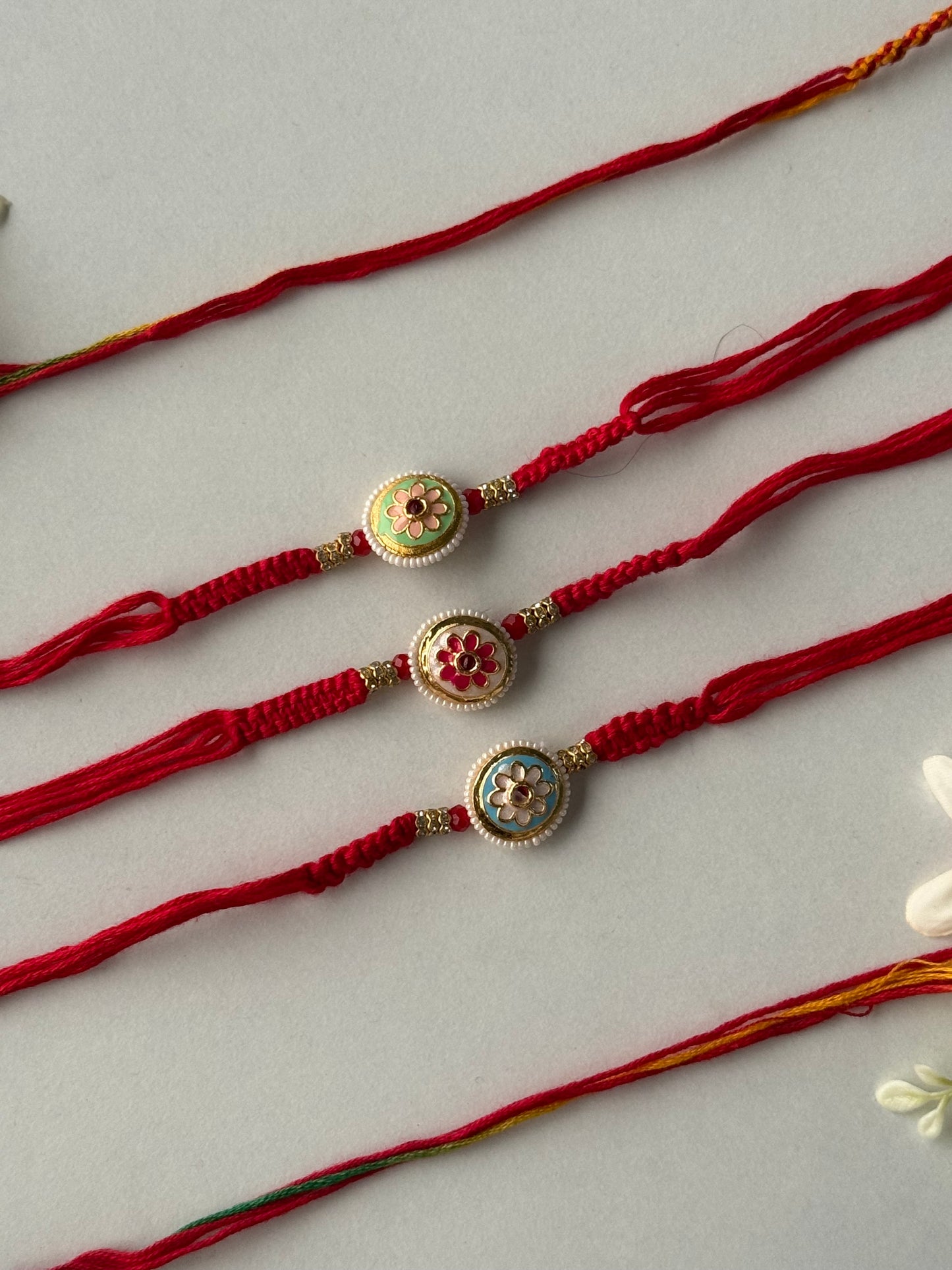 Assorted Flower Pendant Rakhi