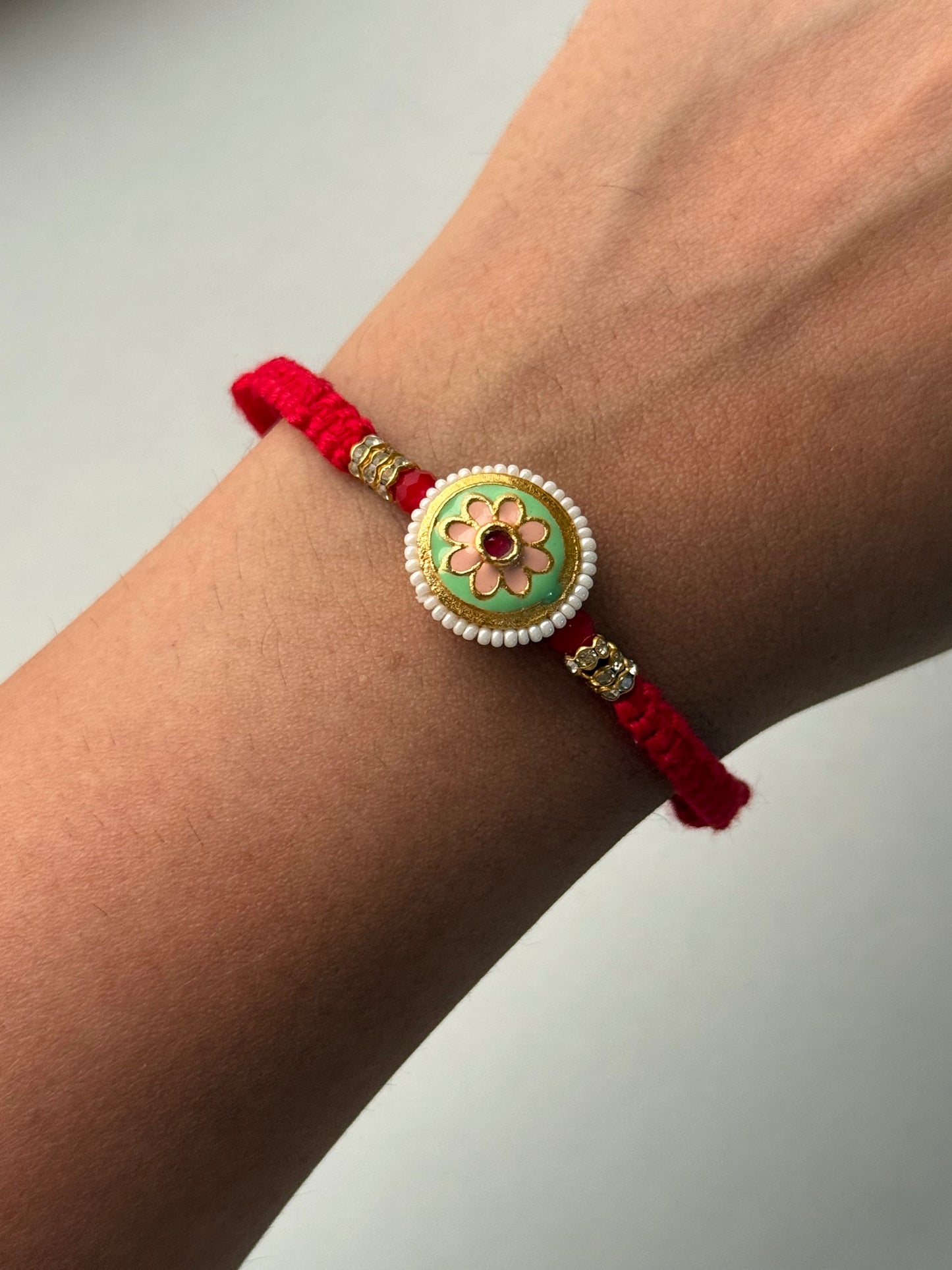 Assorted Flower Pendant Rakhi